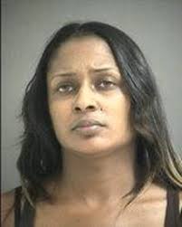 Accused of passing fake checks, one sister gets probation, the other takes  off