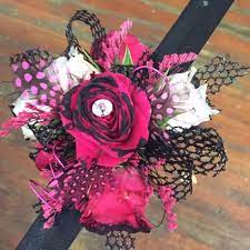 So if you're looking to add something a little different to your floral display, here are a few in a floral arrangement, they work well with yellow, white or pink tulips and look stunning when paired with yellow pansies. Hot Pink Black Tipped Corsage By Flower Tique