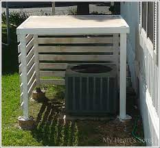 See more of our favorite garden hacks: My Heart S Song Heat Pump Shelter Shade A Guy S Diy Air Conditioner Cover Outdoor Heat Pump Pool Equipment Cover