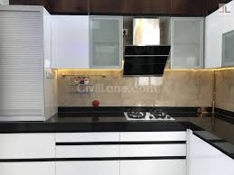 This kitchen design consists of two adjoining walls that are perpendicular to each. L Shaped Modular Kitchen Design Acrylic Finish Pune Civillane