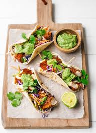 Crispy fish tacos with sauce, fish, mayonnaise, tomato salsa, sour cream, cod filets, lime, salt, freshly ground black pepper, pillsbury best all purpose flour, sugar, salt, cayenne pepper, freshly ground black pepper, club soda, lime juice, crisco pure add to meal planner. Mexican Fish Tacos With Avocado And Jalapeno Sauce Dish Dish Magazine
