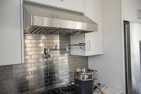 Kitchen With Stainless Steel Mini Brick Tile Backsplash Transitio Stainless Steel Tile Backsplash Stainless Steel Kitchen Backsplash Metal Backsplash Kitchen