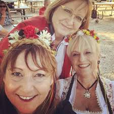 MEMBERS MEET OUTSIDE AS CLUB HOSTS ITS NEW BIERGARTEN GRAND OPENING