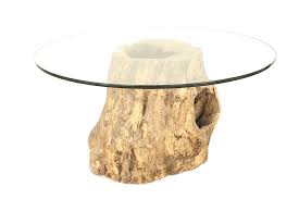 I made this coffee table with a lamp inside out of an old hollowed out tree stump. Rustic Adirondack Style Tree Trunk Dining Table