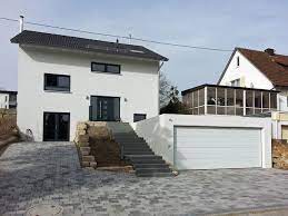 My diy way to screw brackets into cement, same as brick. Grossraumgarage Im Hang Eingebaut Garage Stuttgart By Martin Hofer Fertiggaragen Houzz