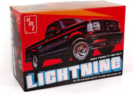 Bringing together two ford icons: Amazon Com Amt 1994 Ford F 150 Lightning Pickup 1 25 Scale Model Kit Toys Games
