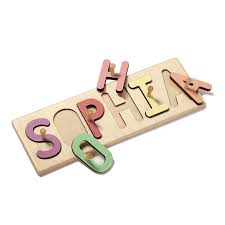 Teach your toddler how to spell their name through play! Personalized Wooden Name Puzzle Available With Without Pegs
