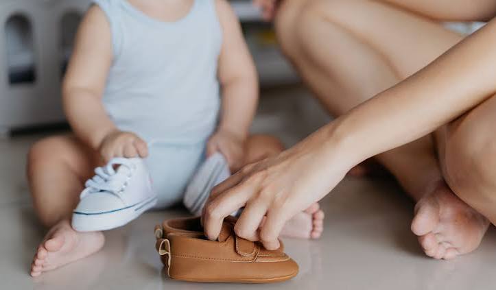 When should my baby get their first pair of shoes?