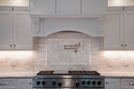 Herringbone Pattern Backsplash In Carrera Marble Carrera Marble Kitchen Super White Quartzite Kitchen Backsplash Designs