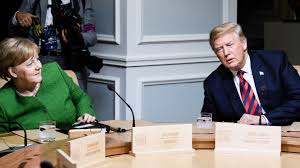 Angela merkel's office has released this photo taken today at the g7, which tells you a lot about how things went. Angela Merkel Warns Trump That Europe Won T Be Had Again