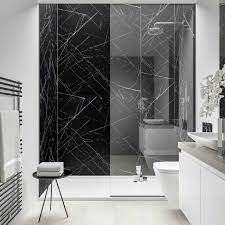 Shower wall panels, wet wall panels or bathroom wall panels, whatever you call them they're one and the same thing. Marble Effect Wall Panels Create A Stylish Stunning Look Without The Expense Or High Mai Black Marble Bathroom Marble Bathroom Designs White Marble Bathrooms