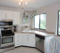 Create an island with more seating, if you consider that lots of people will have dinner. Hugedomains Com Kitchen Design Small Kitchen Remodel Small White Kitchen Remodeling