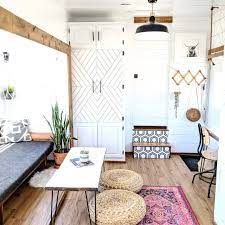 By the home entryway we find a small shoe bench adorned with a couple of cheerful scatter cushions. 19 Tiny House Interior Ideas Design Tips Extra Space Storage