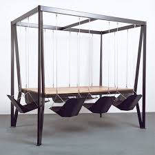 If You Love Swing Chairs Let S Talk About Swing Tables Hunker Swing Table Swinging Chair Room Swing