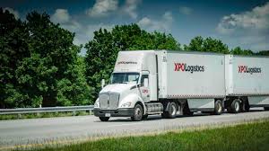 xpo posts lower second quarter revenue scales back top line