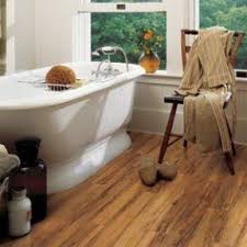 Pros And Cons Of Laminate Flooring Vs Hardwood Vinyl Other Flooring Rustic Wood Floors Flooring Plywood Flooring