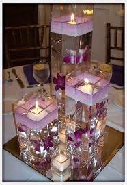 At jj's house, you'll find the high quality, inexpensive flowers you're searching for to fill your bridal bouquets, boutonniere, wrist corsages, and so much more. Beautiful And Inexpensive Purple Wedding Centerpieces Purple Wedding Centerpieces Wedding Centerpieces Inexpensive Wedding Flowers