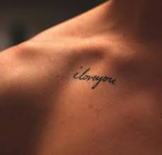 Colored puzzle i love you sign tattoo. Cute Love Tattoos