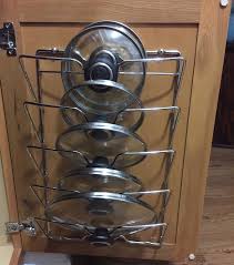 Target / kitchen & dining / pot lid organizer. 34 Storage And Organization Products With Small Price Tags And Big Results Pot Lid Storage Craft Storage Cabinets Storage And Organization