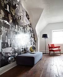 A wooden beam with lots of black and white photos from how to display your photos without actually touching the walls? Craft Your Style Decoupage And Decorate With Custom Wallpaper