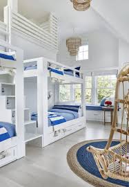 Cute Bunk Beds In A Coastal Kids Room Nautical Beachy Chandeliers Bamboo Rattan Blue And White Coastal Bedrooms Beach House Bedroom Beach House Decor