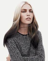 Pale Blonde Hair With The Ends Dip Dyed In Black Reverse Ombre Hair Dip Dye Hair Hair Color Trends