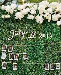 Custom it with a floral garland or add lettering to customize it to your special event! Hedge Backdrop With Photographs Boxwood Backdrop Diy Wedding Backdrop Outdoor Wedding Decorations