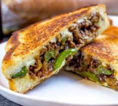 Try this ground beef grilled cheese sandwich! Ground Beef Philly Cheesesteak Grilled Cheese Sandwiches Recipe Recipes Philly Cheese Steak Ground Beef Recipes
