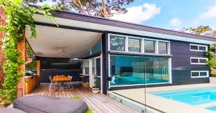 Many of us would love to have a mini home and time to travel in one. Luxury Modern Small Home Built In Suburban Backyard