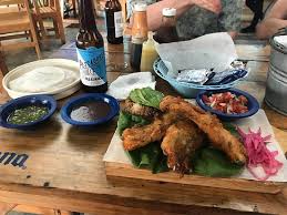 Far from the oily, breaded fish tacos you've had before, these tacos are perfect summer fare, getting their flavor from beautiful swordfish, the smoke of the grill, and the tangy, complex flavor of yucatan rojo bbq rub. The Crackling Fish Fish Tacos Picture Of Los Aguachiles Tulum Tripadvisor