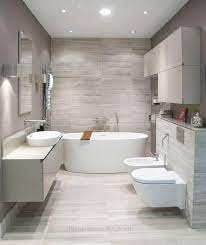 The original feathered pendant light adds beautiful movement and contrasts the geometric stool on the floor. Bathroom Inspiration The Do S And Don Ts Of Modern Bathroom Design 29 Home Decor For Us Contemporary Bathroom Designs Bathroom Interior Design Modern Bathroom