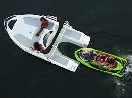 Pontoon Boat Powered By Jet Ski In 2021 Ski Boats Jet Ski Fishing Jet Ski