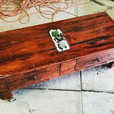 All the cracks and rot holes were meticulously filled with clear resin to capture the natural beauty. Redgum Pallet Coffee Table 5 Steps With Pictures Instructables