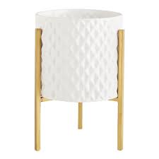 Geometric White Ceramic Brass Stand Planter Nestled in a matte white pot and delicately detailed to fool the eye.