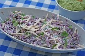Whisk together the juices, oil, ancho powder, garlic and salt and pepper, to taste, in a small bowl and let stand 10 minutes at room temperature. Fish Tacos With Cabbage Slaw Bobby Flay