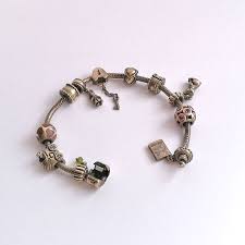 How To Remove Tarnish From Silver Jewellery My Pandora Bracelet Fix Pandora Earrings Cleaning Pandora Bracelet Tarnished Jewelry