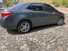 Tenemos el mejor surtido en repuestos para tu toyota corolla aqui tenemos venta de pickup usados en , tenemos capos, radiadores, muletas, condensadores, amortiguadores, silvines, bumpers y mucho mas. Toyota Corolla S 2015 Nitido En Ganga Venta De Carros En Guatemala
