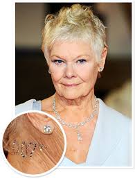 Each number has a style of its own. Judi Dench Wore A 007 Crystal Tattoo To The London Skyfall Premiere Instyle