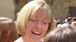 Mother-of-two, 54, died after being hit by a train as she crossed railway  line while walking her dog