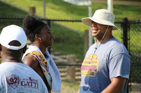 Evans conducts Character Football Camp