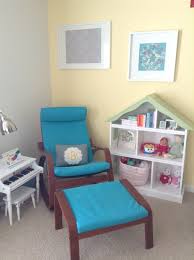 Tessa S Modern Nursery Yellow And Gray With Pops Of Teal And Pink Land Of Nod Dollhouse Bookcase Ikea P Ikea Ribba Frames Poang Rocking Chair Ikea Dollhouse