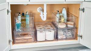 Use baskets, bins and jars for extra storage. 11 Genius Under The Sink Storage Ideas Best Sink Organizers
