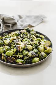 For crispy results, preheat your baking sheet. Crispy Brussels Sprouts With Parmesan And Honey Glaze Sweet Cayenne