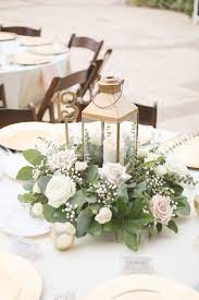 Rustic Nautical Outdoor Wedding Reception Round Table Decor With Gold Hurricane Lantern And Lo Round Table Decor Wedding Table Decorations Round Wedding Tables