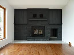 Laminate flooring on fireplace wall. Magnificent Monotone Fireplace Wall In Dark Gray Homebnc