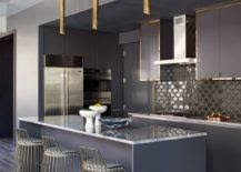 The kitchen cabinets are made from stained marine plywood with a simple and sleek profile and uses a light gray granite countertop. Fdqvfey Uxam7m
