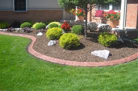 You can sometimes get a truck to pour concrete straight into your form; Friendly Edge Decorative Concreate Curbing