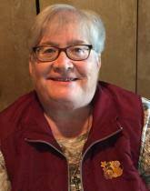 Passing of the gavel from DG Don Kuehl to DGE Patty Peterson