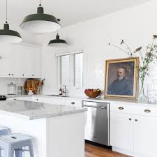 A mixture of baking soda and water will often remove sticky or greasy spots off of kitchen cabinets. How To Green Clean Grease From Kitchen Surfaces Apartment Therapy