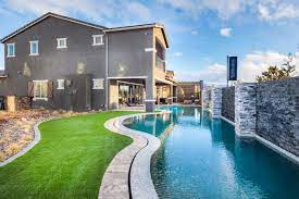 Take A Swim And Enjoy The Outdoors With This Striking Backyard Space From Toll Brothers At Inspirada Laramie Mod Real Estate Houses Outdoor New Homes For Sale